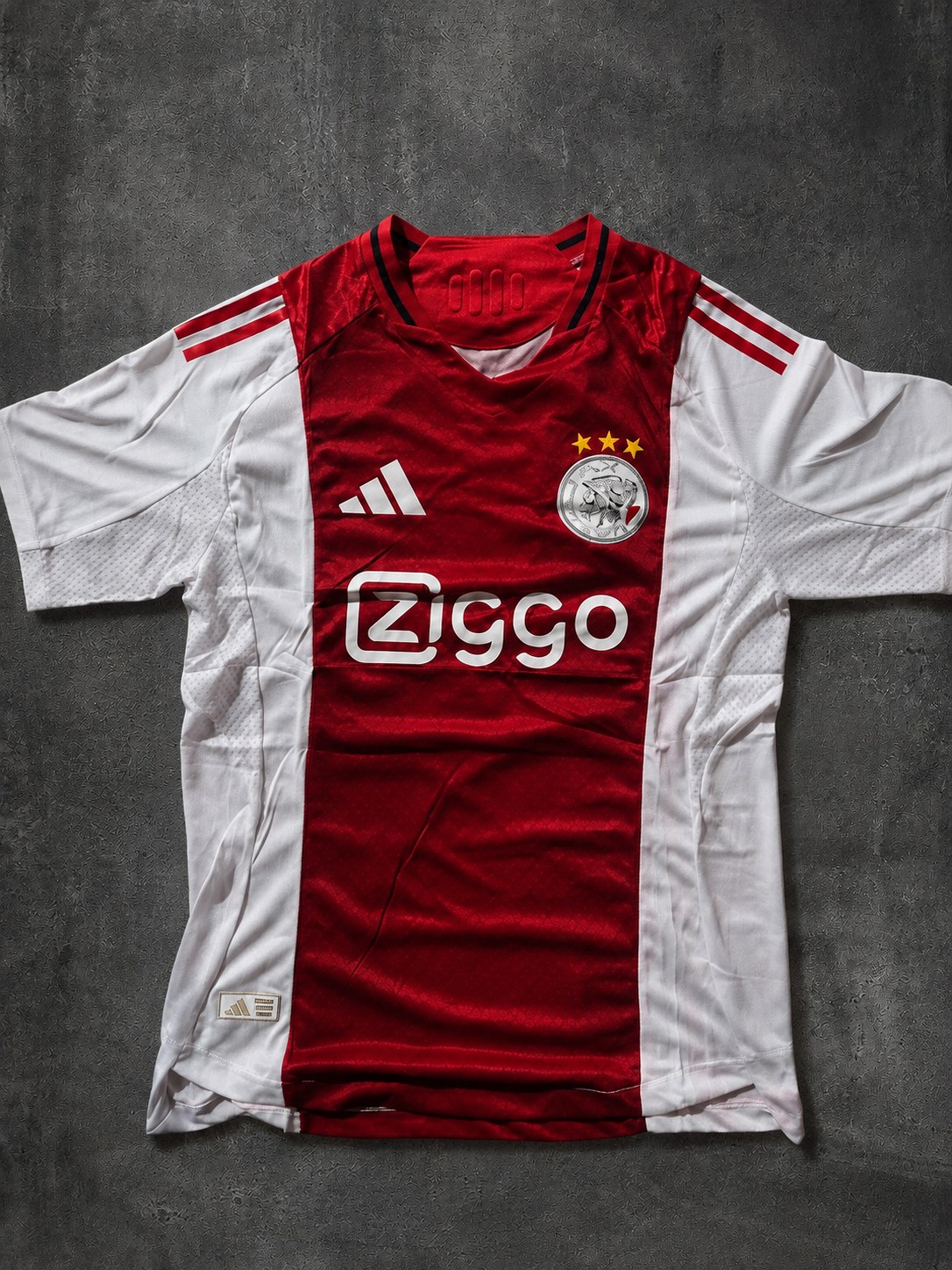 Ajax 25/26 frente