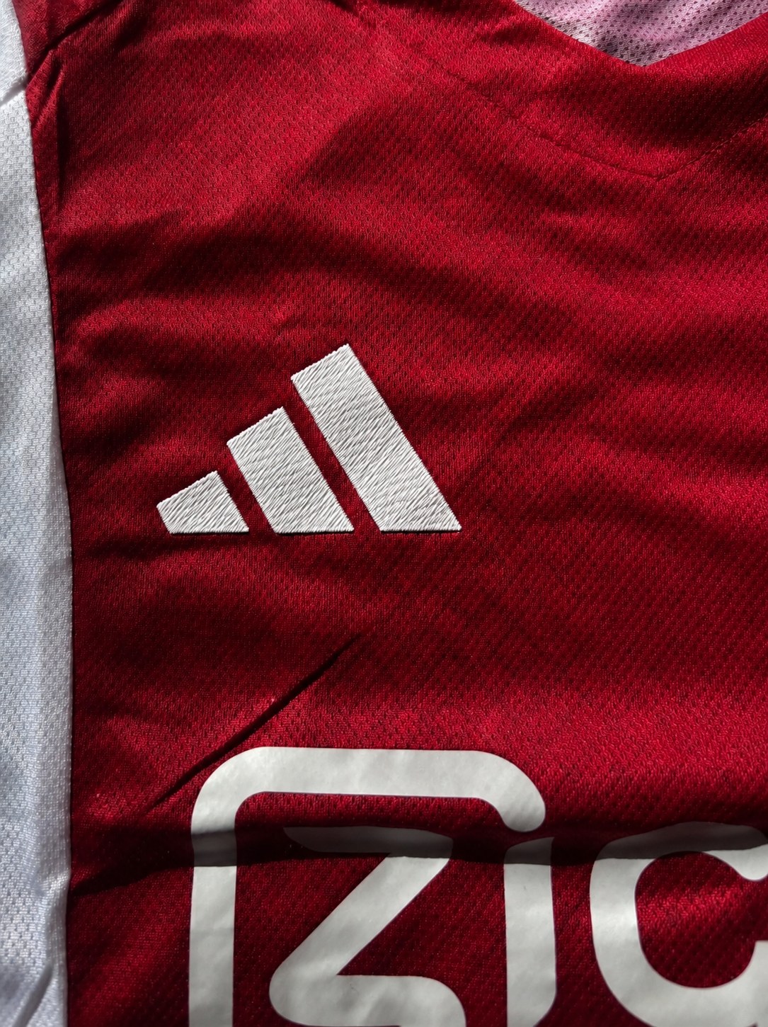 Ajax 25/26 detalle logo